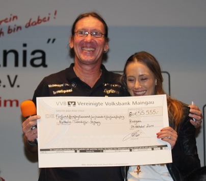 Andreas Beseler überreicht Spenden-Scheck in Höhe von € 55.555,-